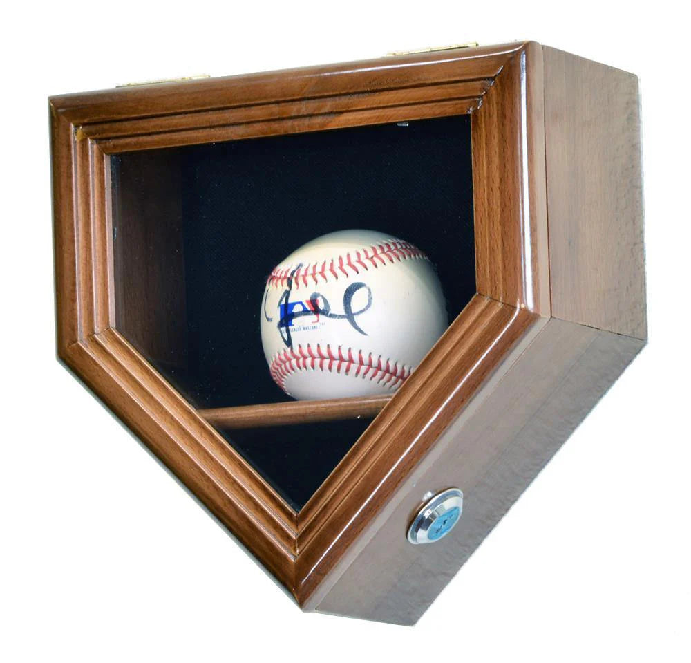 Baseball in a wooden home plate shaped display case with a signature on a white background