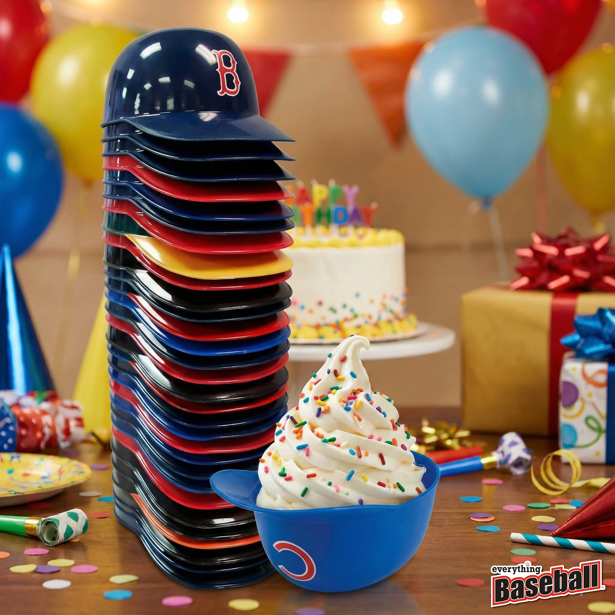 Stack of baseball-themed ice cream helmets with a bowl of ice cream and birthday cake in the background.