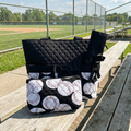 NGIL Baseballs on Black Quilted Diaper Bag on the bleachers at the ball field