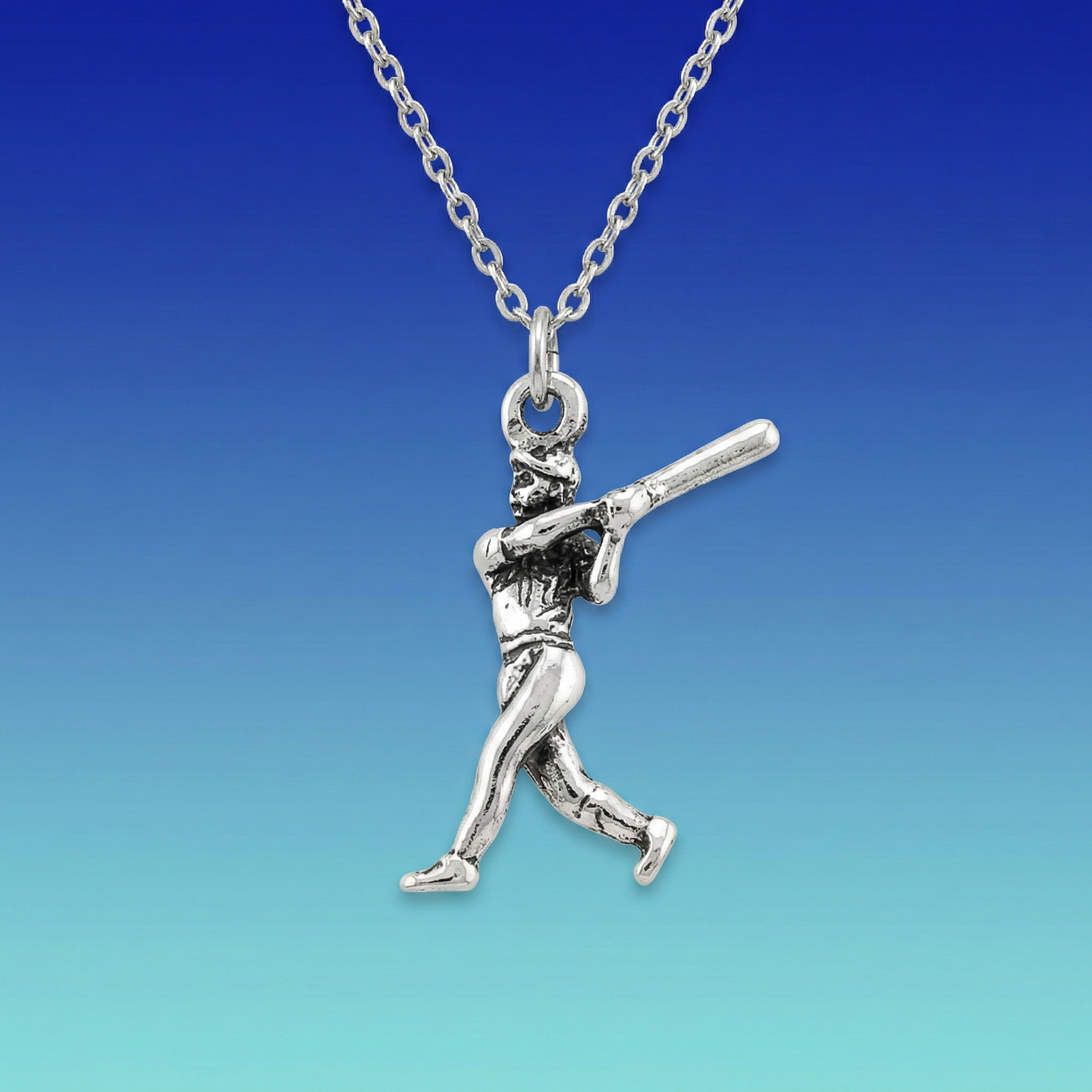 Silver baseball player pendant on a chain against a gradient blue background