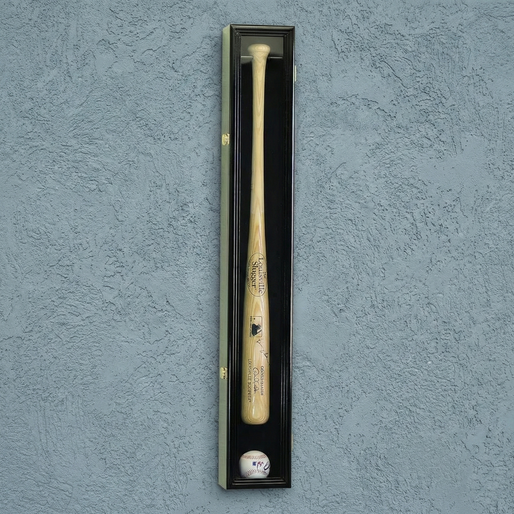 Baseball bat and ball in a display case against a textured blue wall