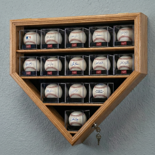 Wooden baseball cube home plate display case with signed baseballs against a gray wall