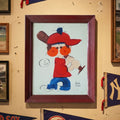 Helyn Mann original baseball canvas painting framed illustration of a child in a red cap and orange glasses on a wall with sports memorabilia.