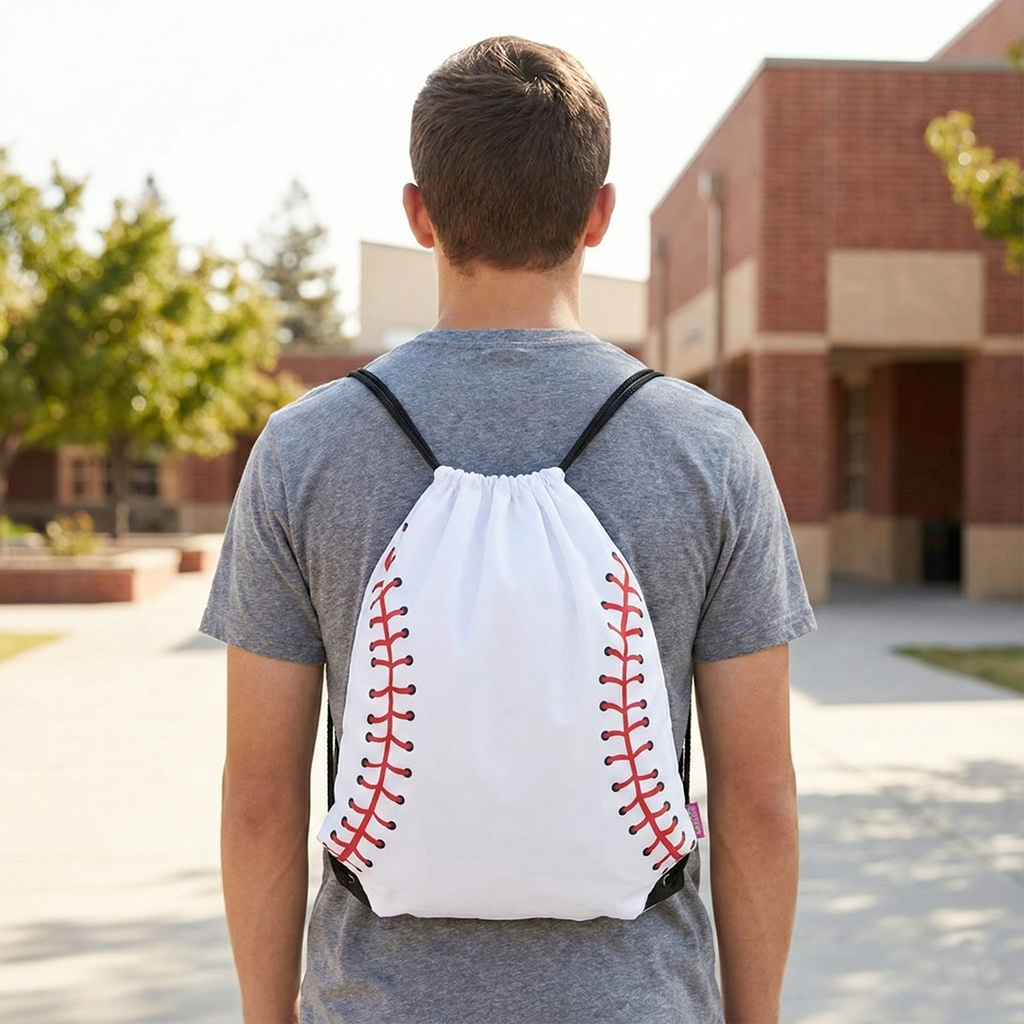 Person wearing a drawstring bag with baseball design outdoors