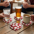 Three drinks on a wooden table with baseball-themed red material home plate coasters