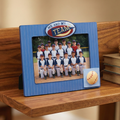 Baseball-themed picture frame with a photo of a baseball team on a wooden shelf.