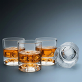 Set of clear baseball whiskey glasses on a gradient gray background