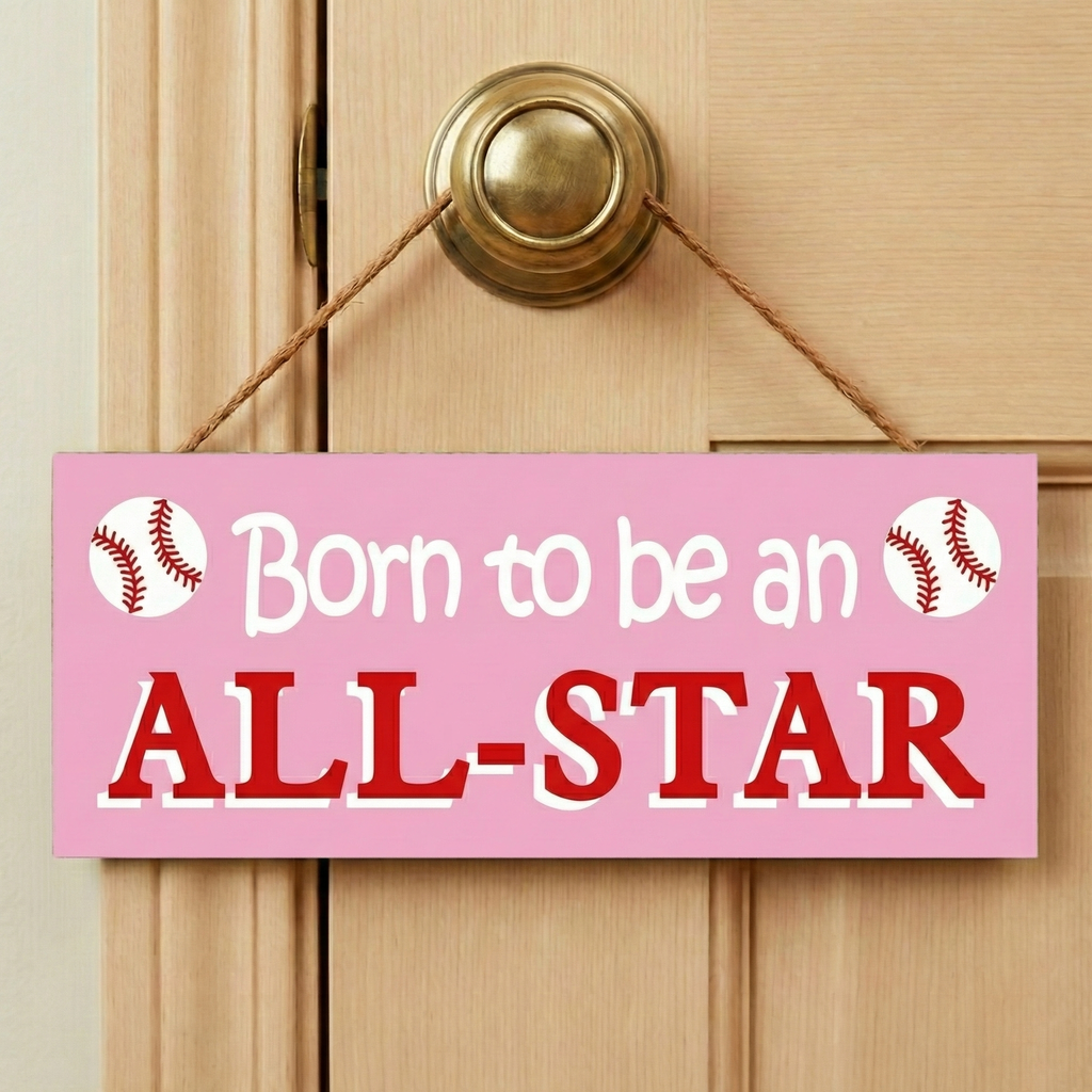 Pink sign with 'Born to be an ALL-STAR' text and baseball graphics on a wooden door.