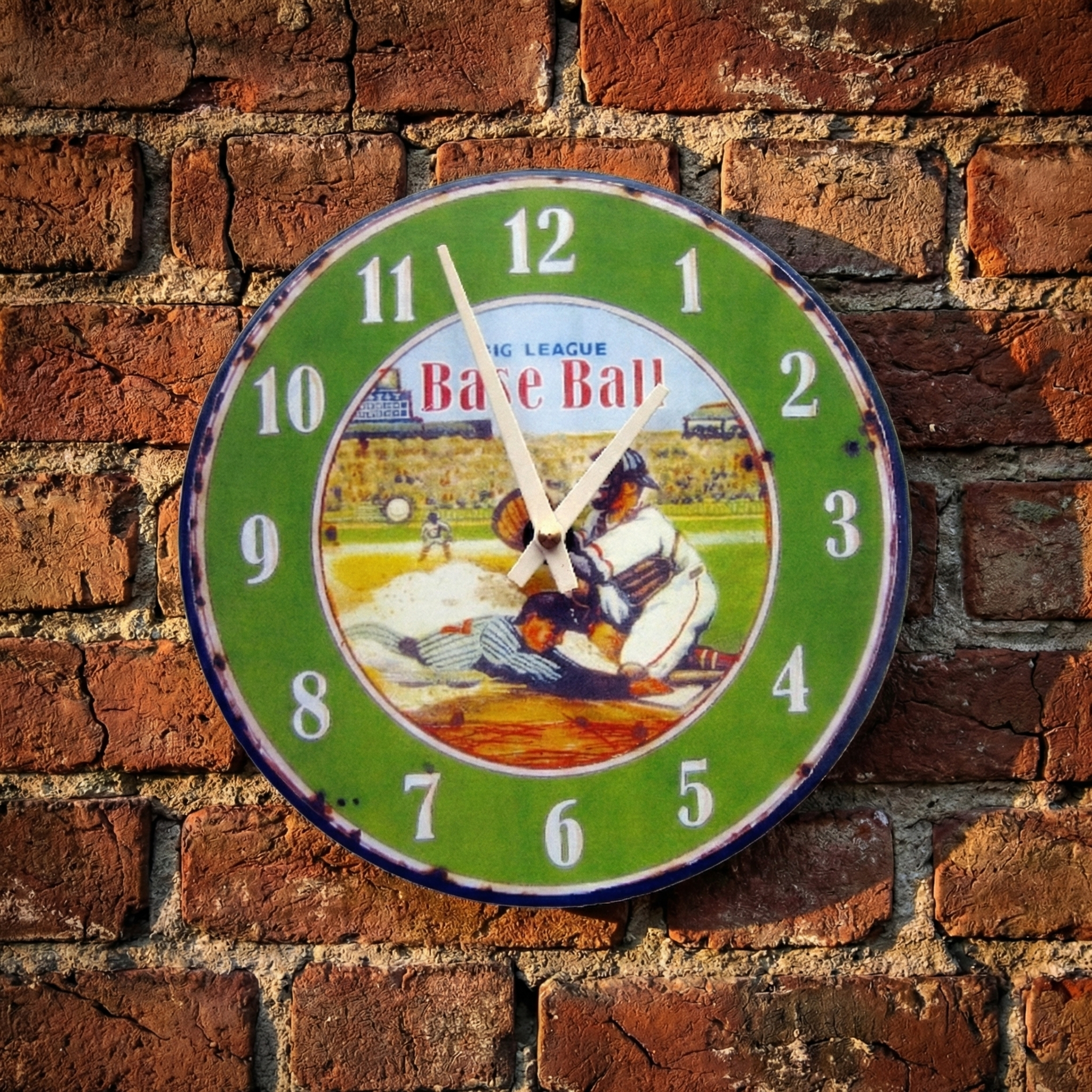 Vintage-style Big League Baseball clock with baseball design on a brick wall