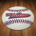 Baseball-shaped flat rug with 'Mike Hurm' branding on a wooden floor