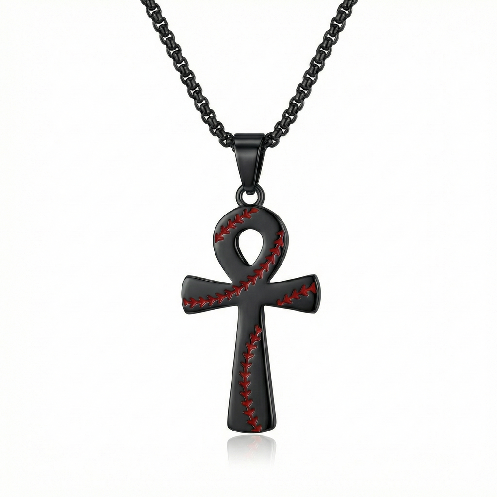 Black cross-shaped pendant with red stitching on a white background