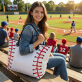 Woman holding a baseball-themed tote bag at a baseball game