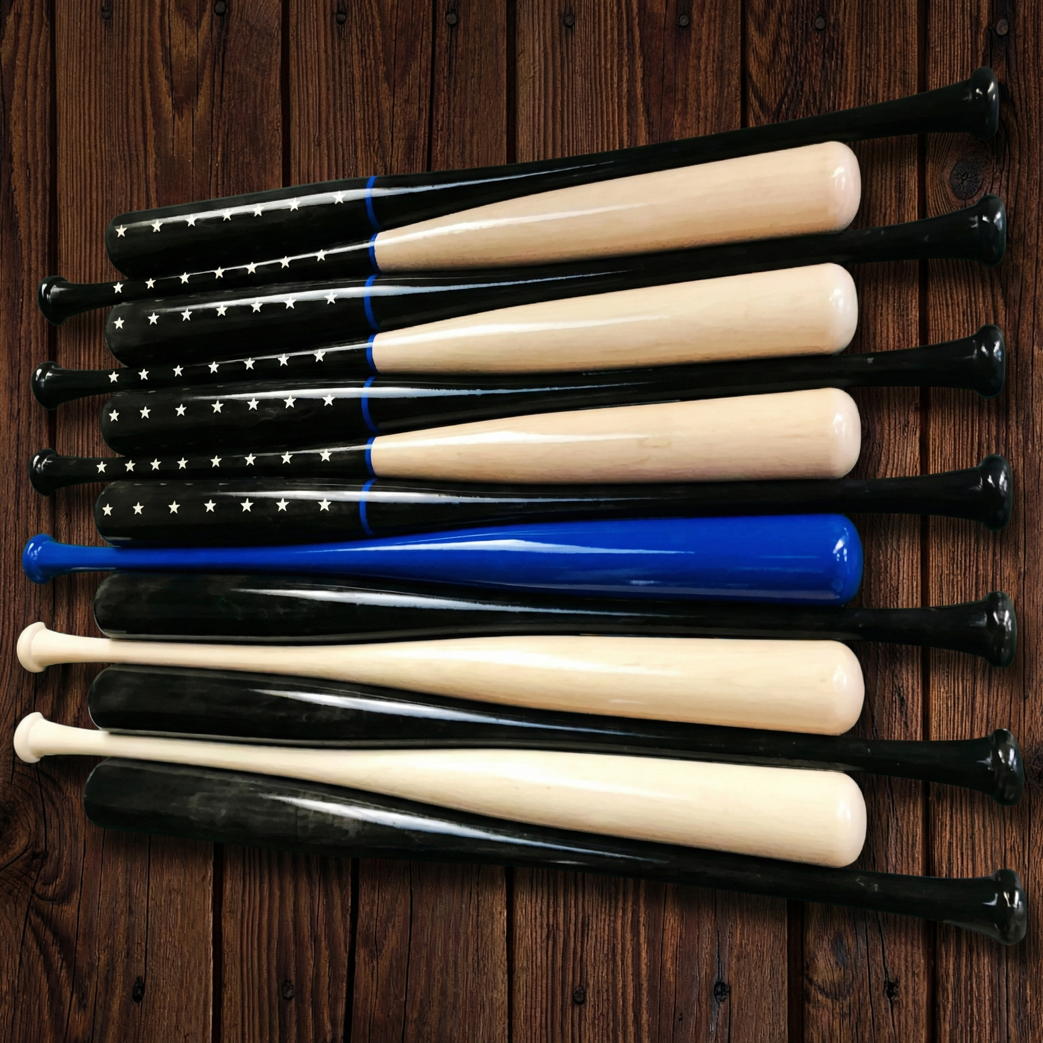 Set of baseball bats making police blue line American flag on a wooden wall