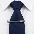 Baseball Bat Silver Tie Clip on a navy blue tie and white dress shirt.