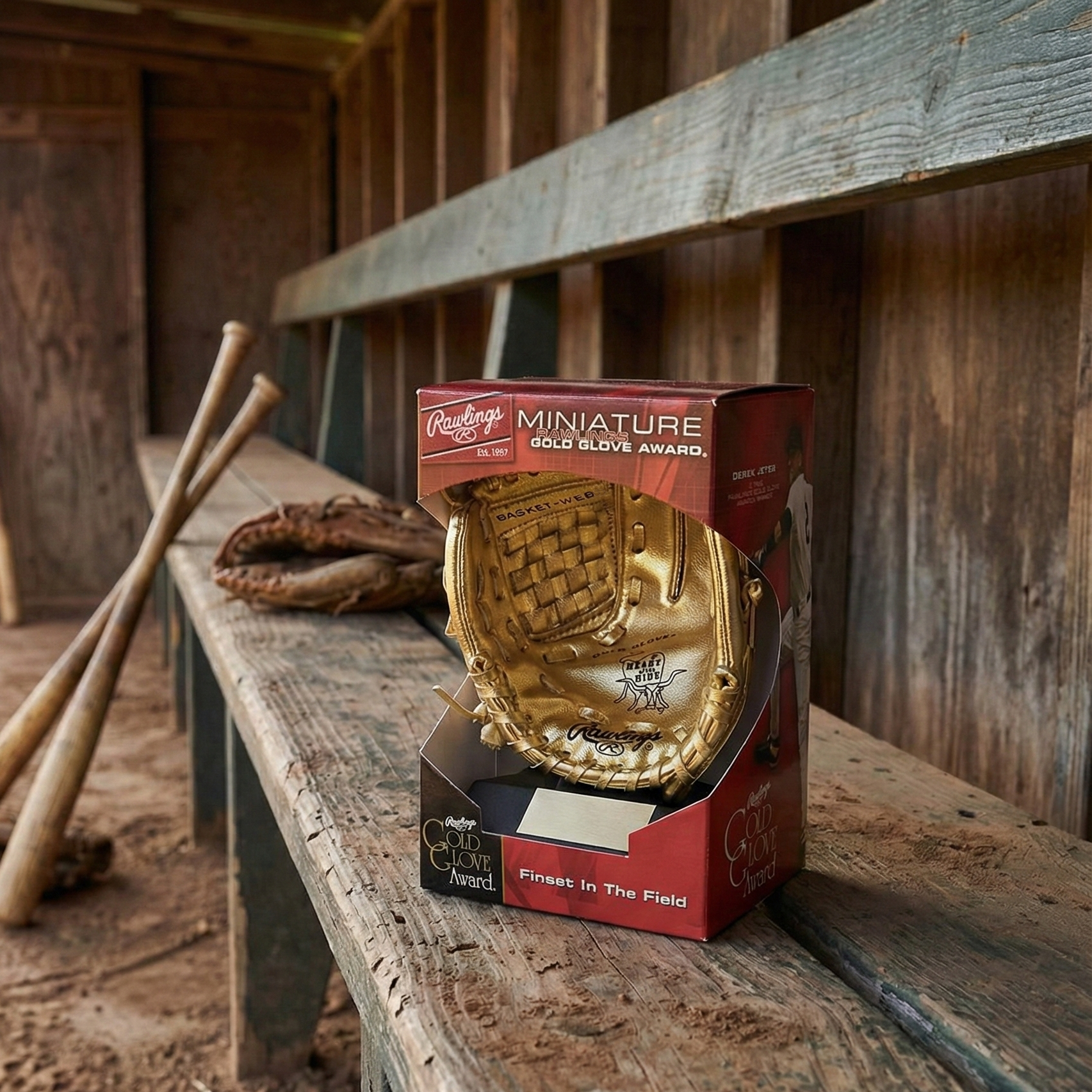 Rawlings Miniature Mini Gold Glove boxes in a baseball dugout. 