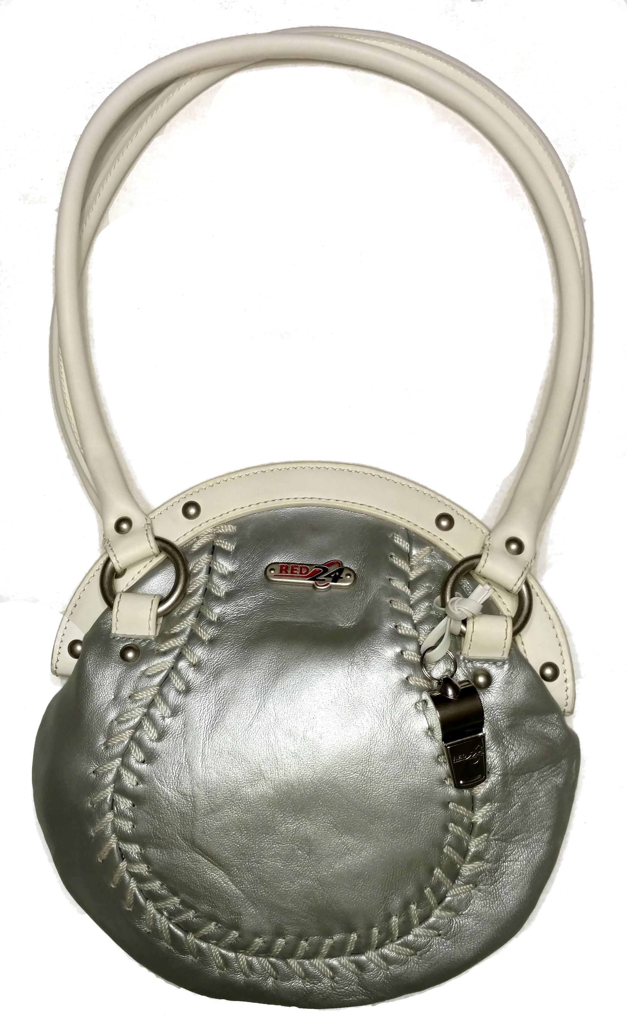 Silver leather handbag designed like a baseball with white handle on a white background