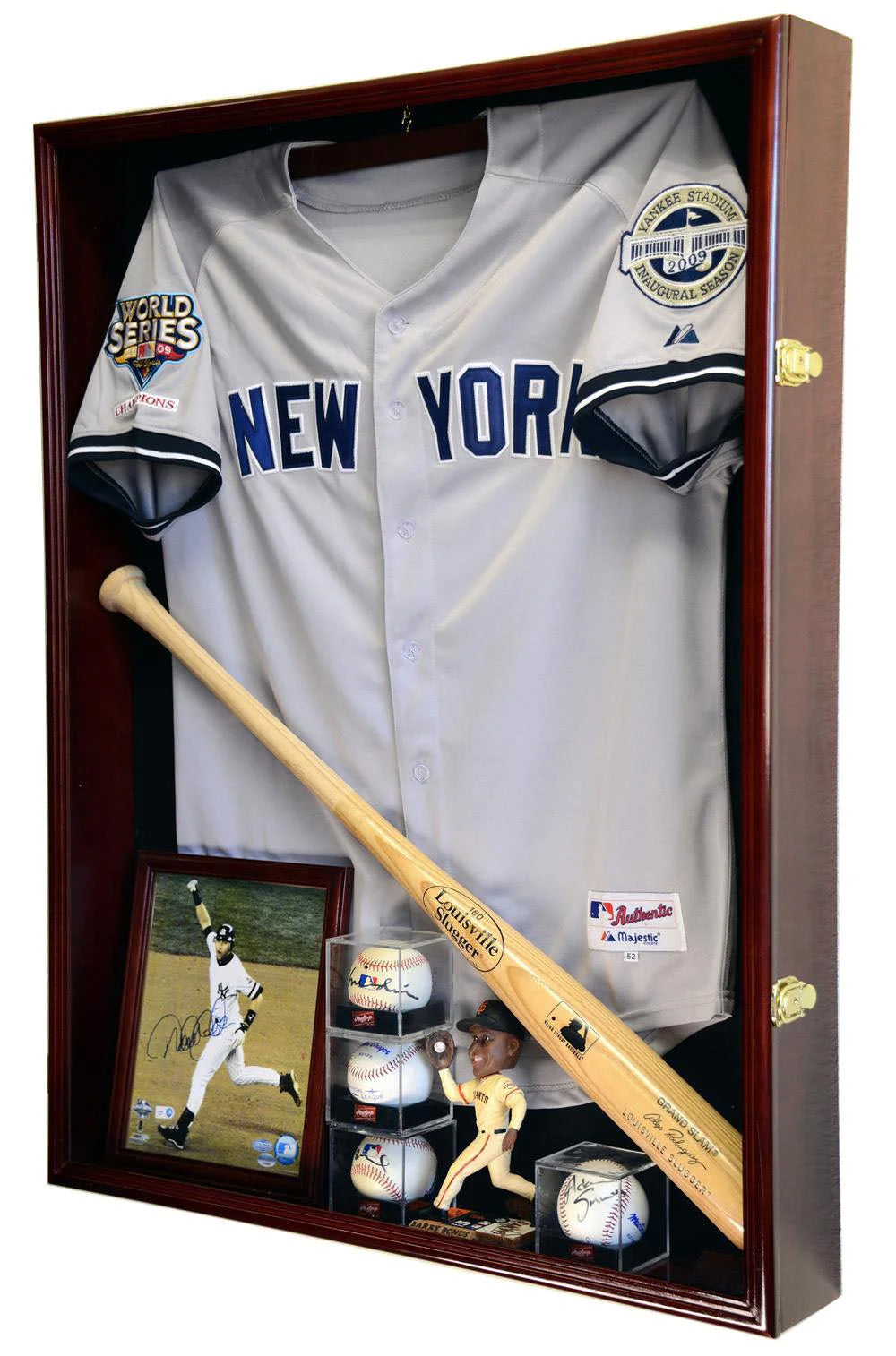 Shadowbox display case with New York Yankees jersey, bat, and memorabilia