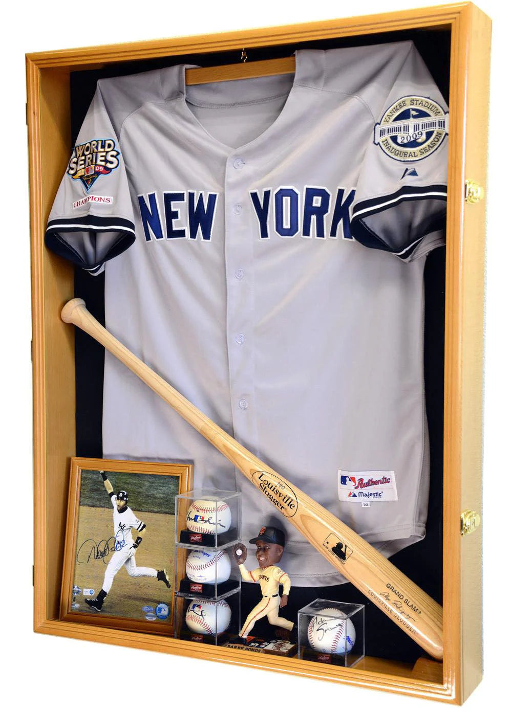 Shadowbox display case with baseball jersey, bat, and memorabilia