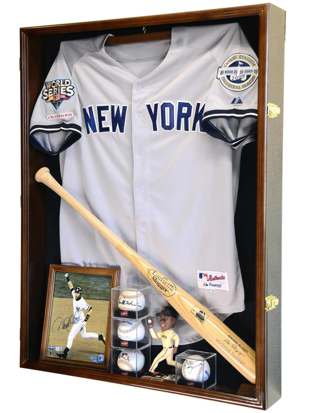 Baseball jersey, bat, and memorabilia in a wooden display case