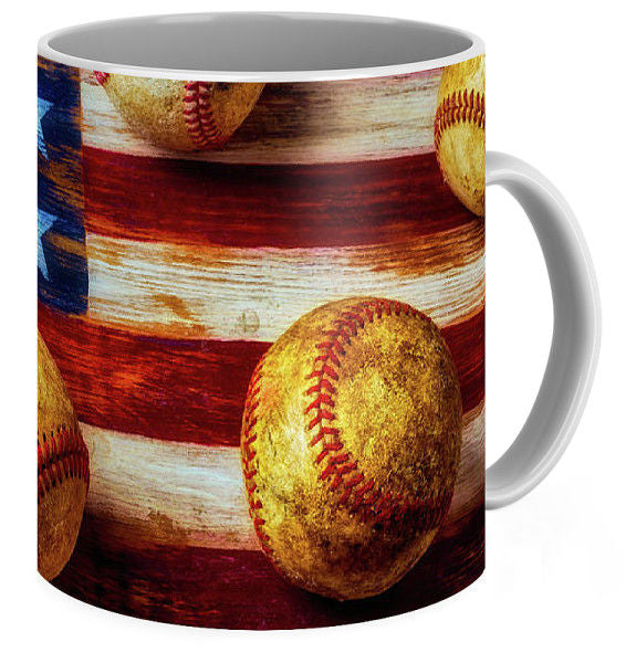 Mug with baseball design on a wooden background