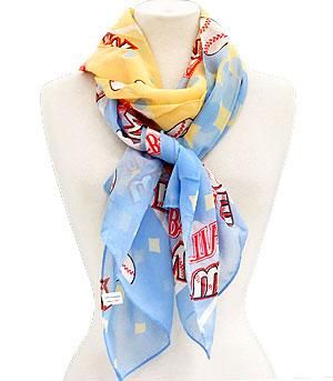 Colorful baseball scarf with cartoon character design on a mannequin
