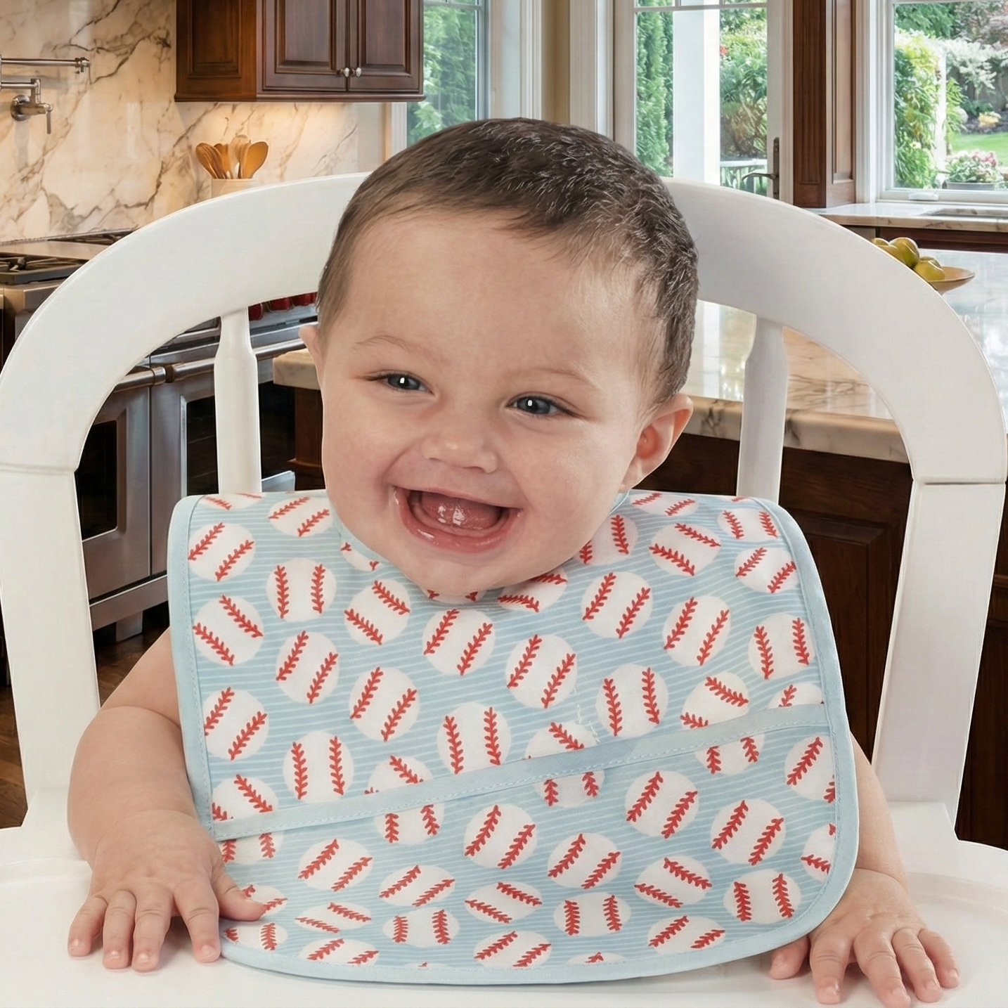 Child wearing a baseball patterned laminated bib in a kitchen setting