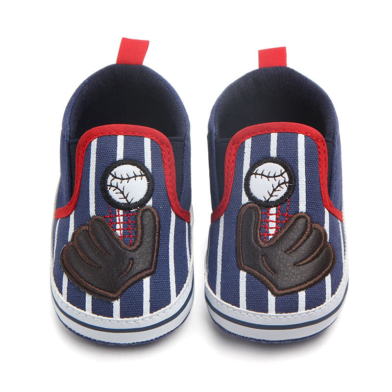 Pair of children's baby slipper shoes with baseball and glove design on a white background