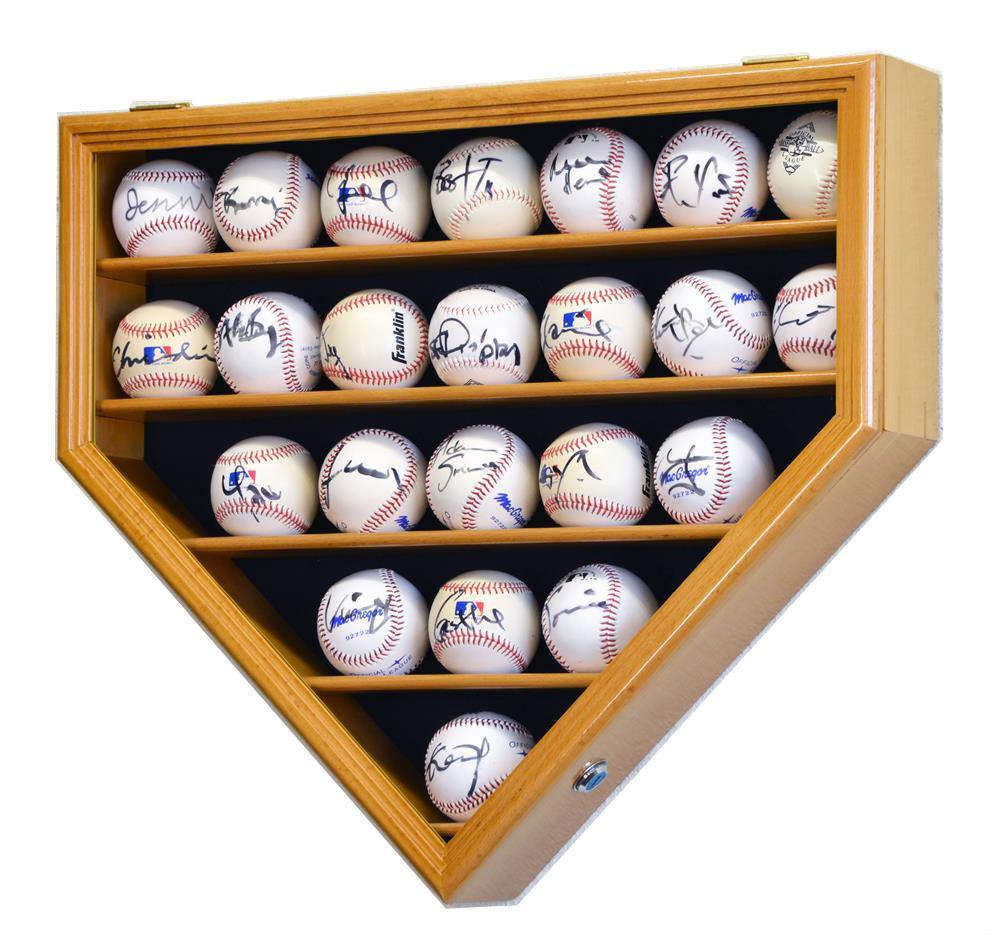 Wooden home plate-shaped display case with autographed baseballs inside