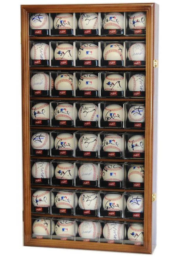 Wooden UV locking display case with shelves holding various baseballs with autographs in acrylic cubes.