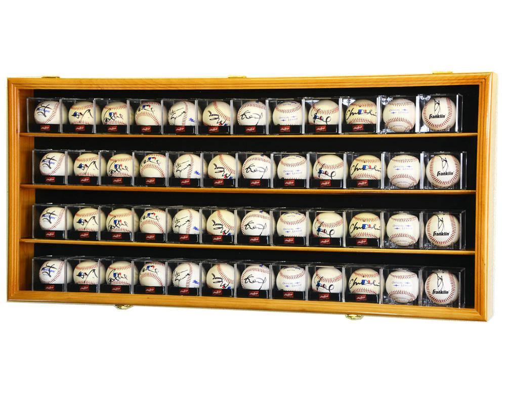 UB locking wooden display case with multiple shelves holding cubed baseballs with autographs on a white background