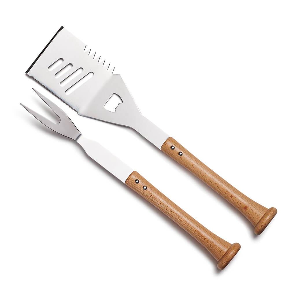 Set of two barbecue utensils with wooden baseball bat handles on a white background