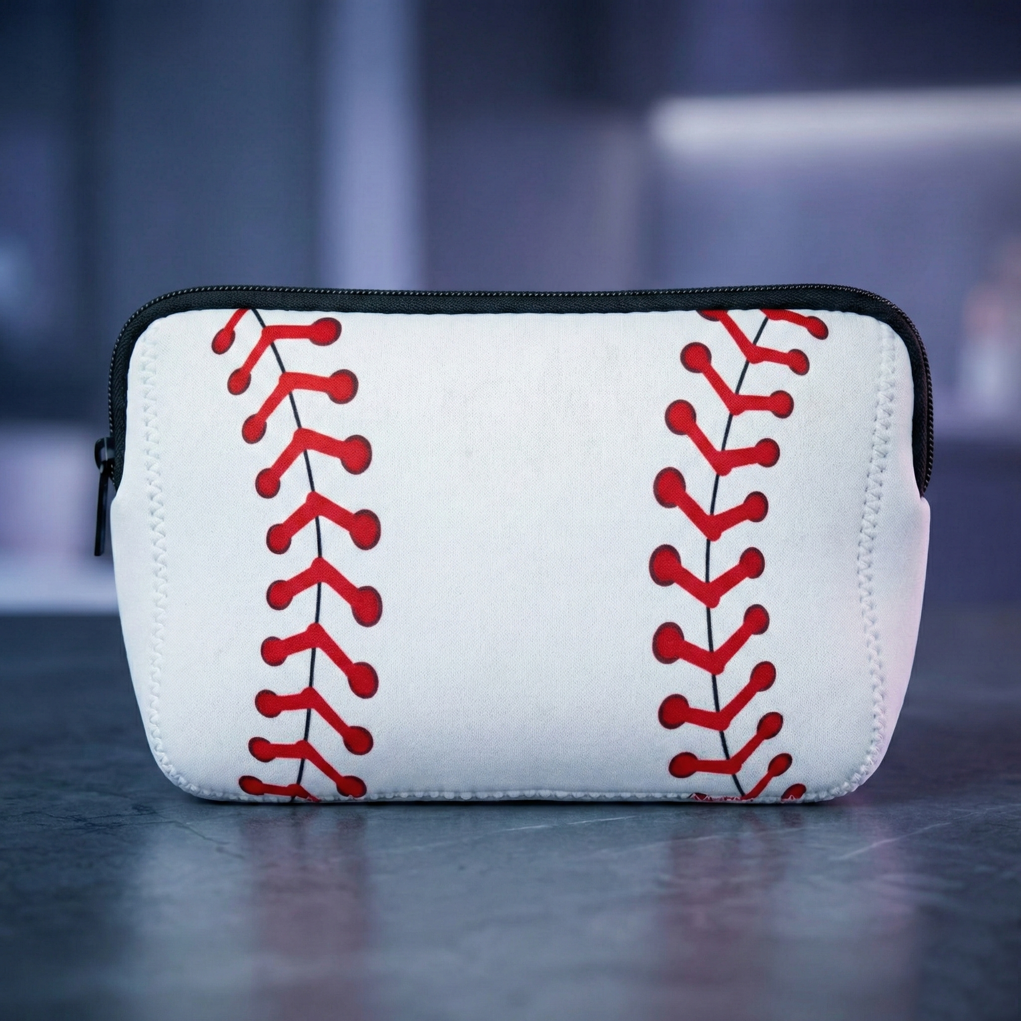 Baseball Laces Cosmetic Bag on a blue background.