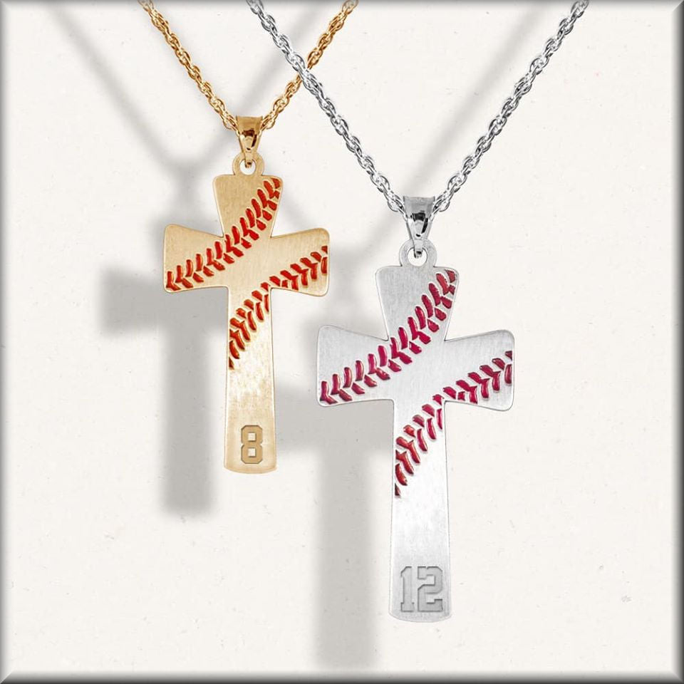 Two baseball cross-shaped pendants with baseball number design on necklaces against a white background