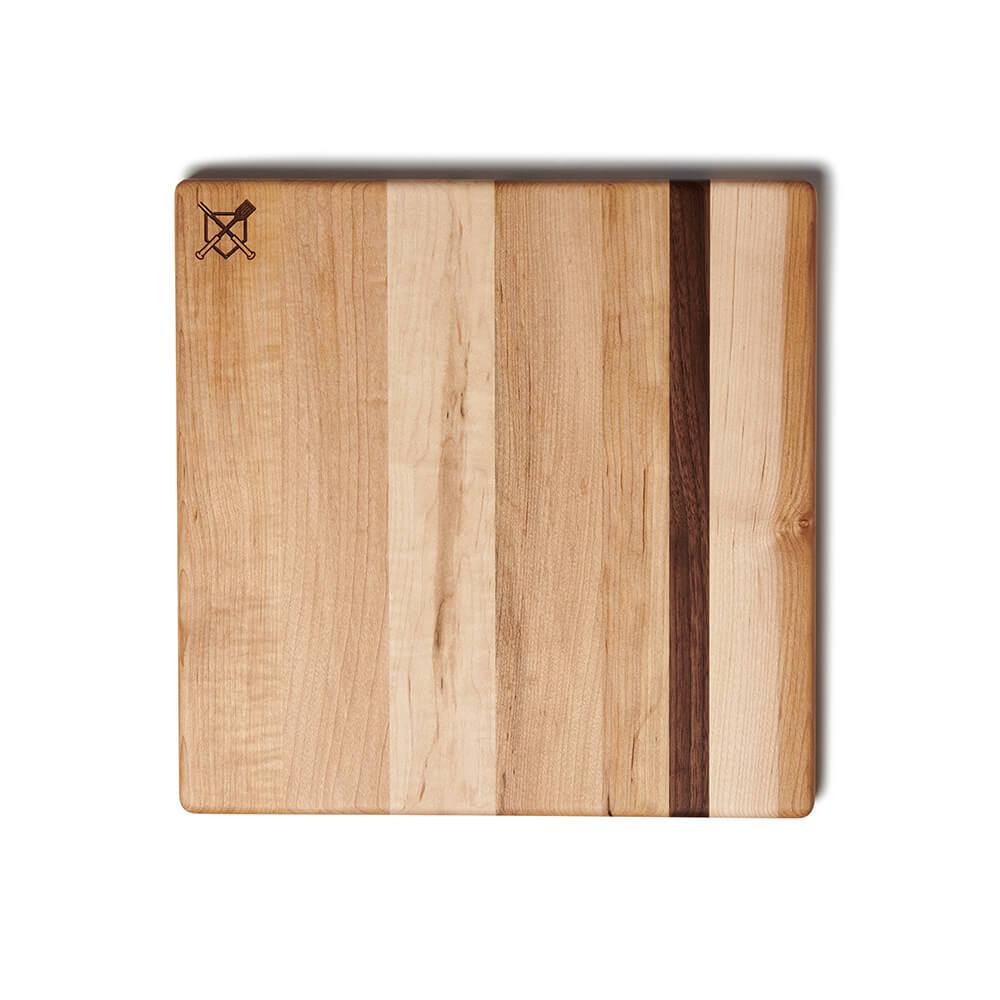 Wooden baseball bbq cutting board with a unique pattern on a white background