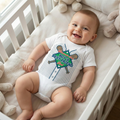 Diamonds Are a Boy's Best Friend Too Baseball Onesie on a baby in a crib