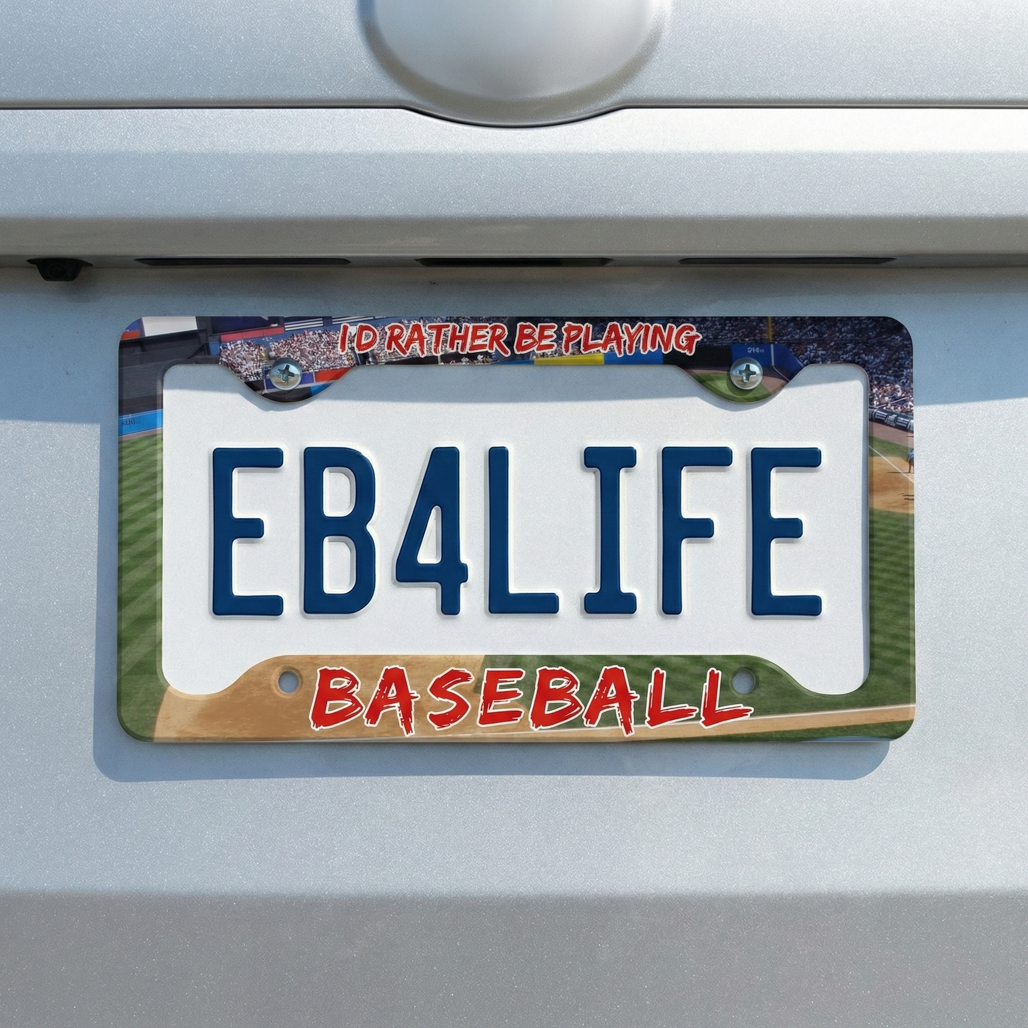 License plate holder with I'd Rather Be Playing Baseball on a car