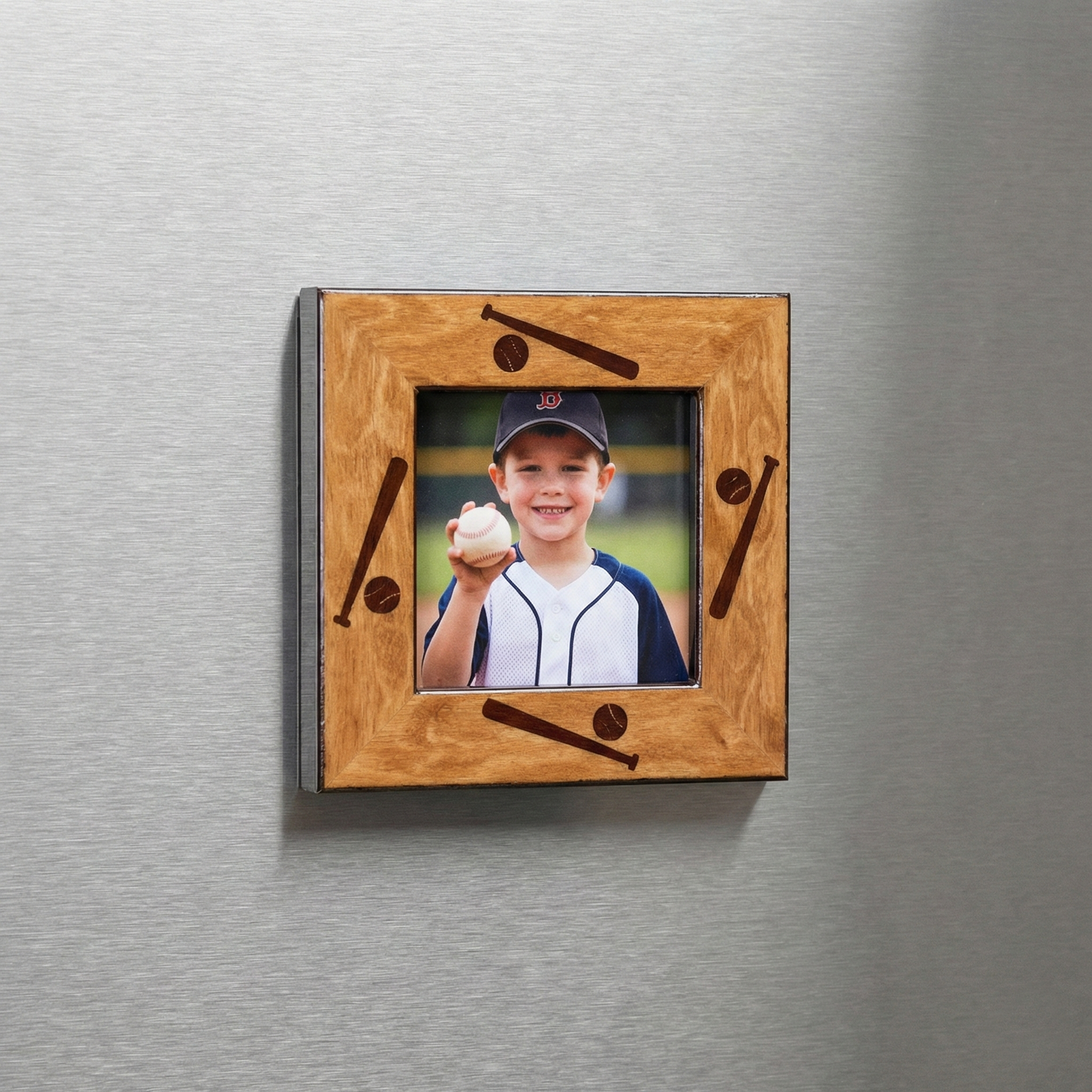 Wooden photo frame magnet with baseball design on a metallic surface