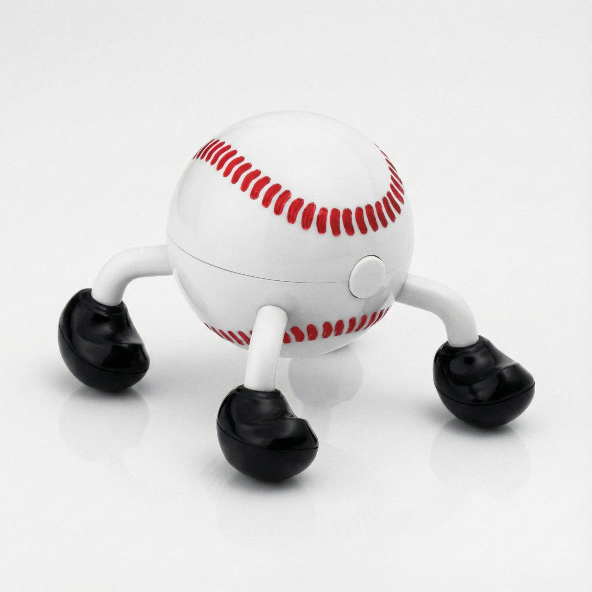 Baseball-shaped electric massager on a white background