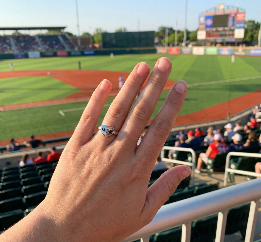 Baseball Mom Heart Silver Ring at the baseball stadium. 