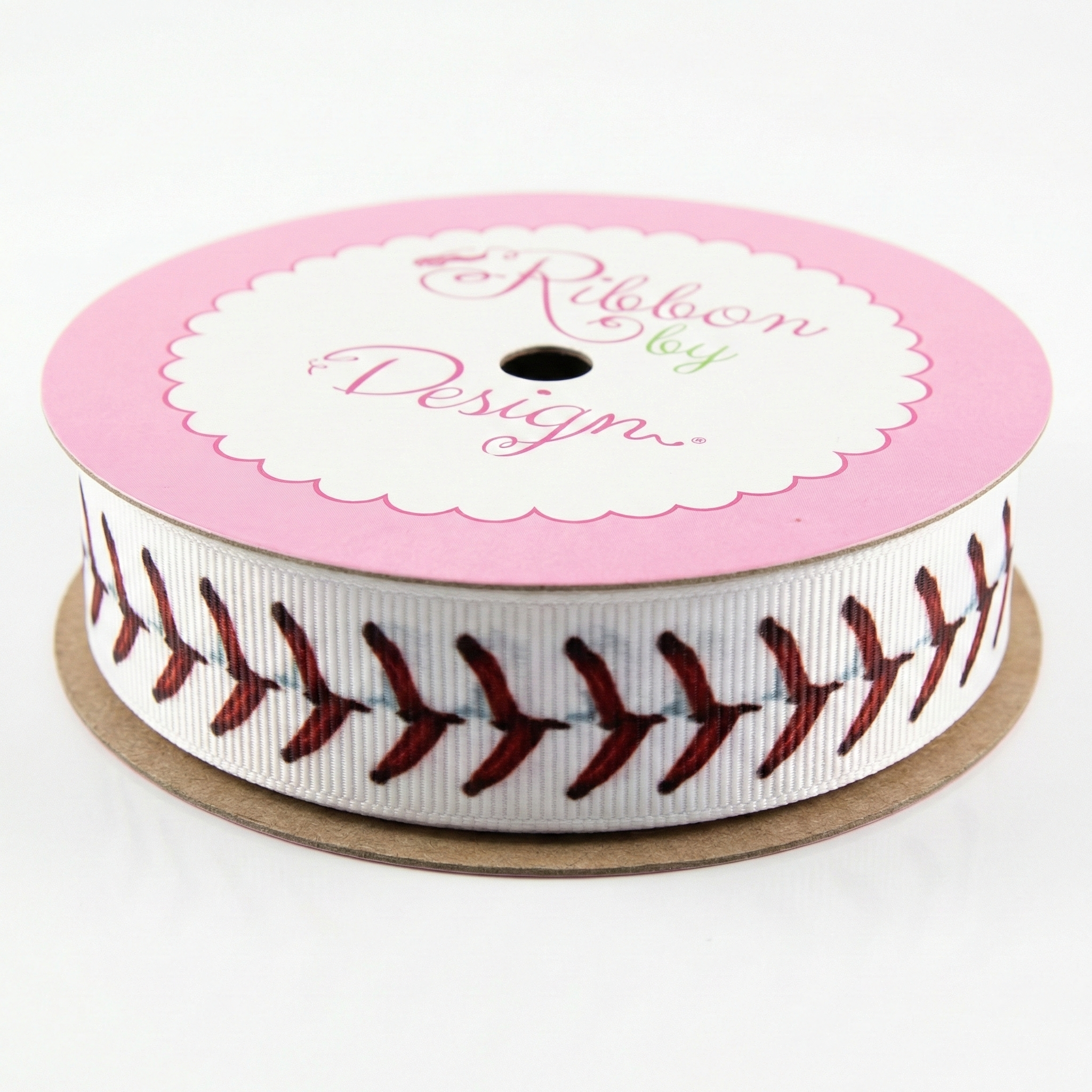 Spool of ribbon with baseball pattern on a white background