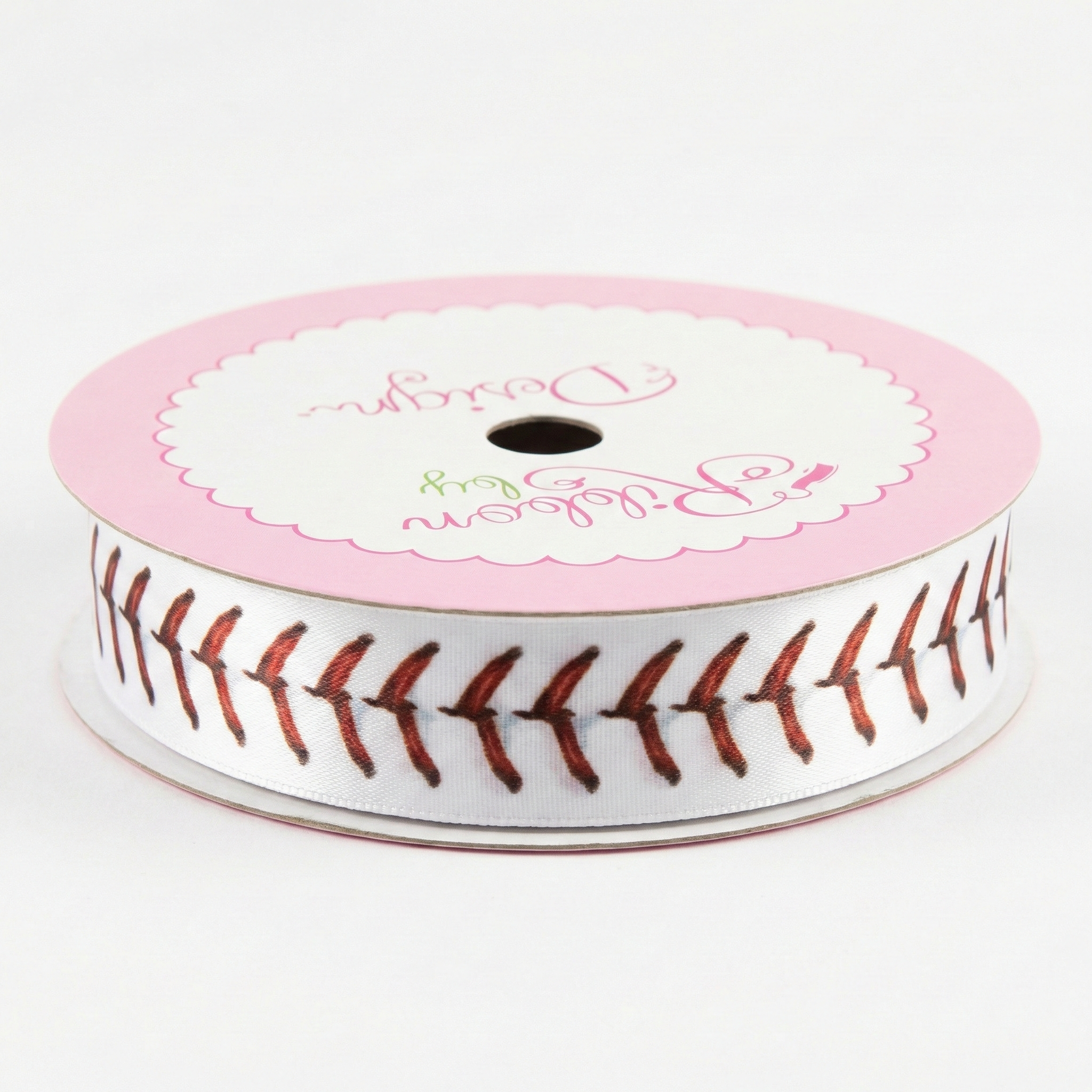 Spool of ribbon with baseball stitching pattern on a white background