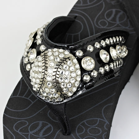 Black baseball sandal with decorative rhinestone embellishments on a white background