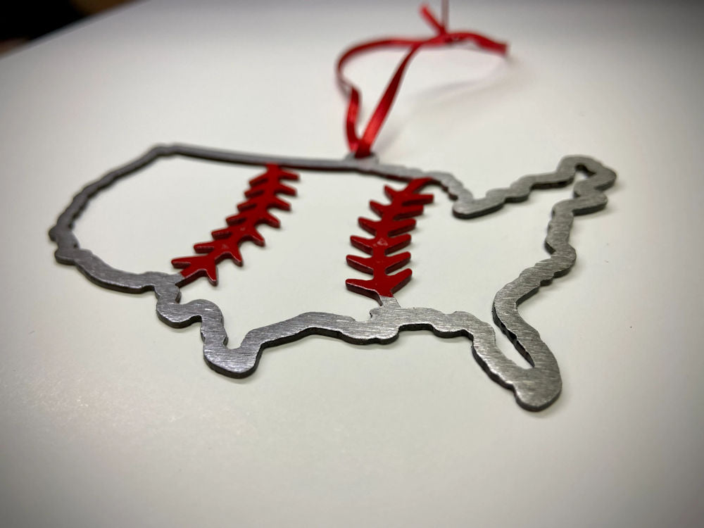 Decorative ornament shaped like a map of the United States with red baseball designs on a white background.