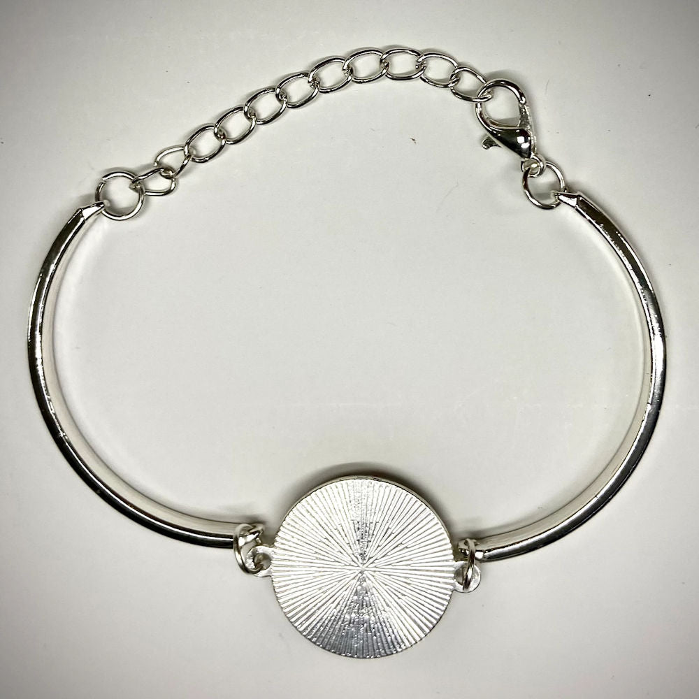 baseball seams silver bracelet back on white background