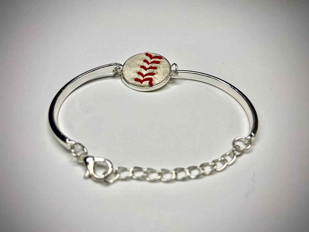 baseball seams silver bracelet on white background