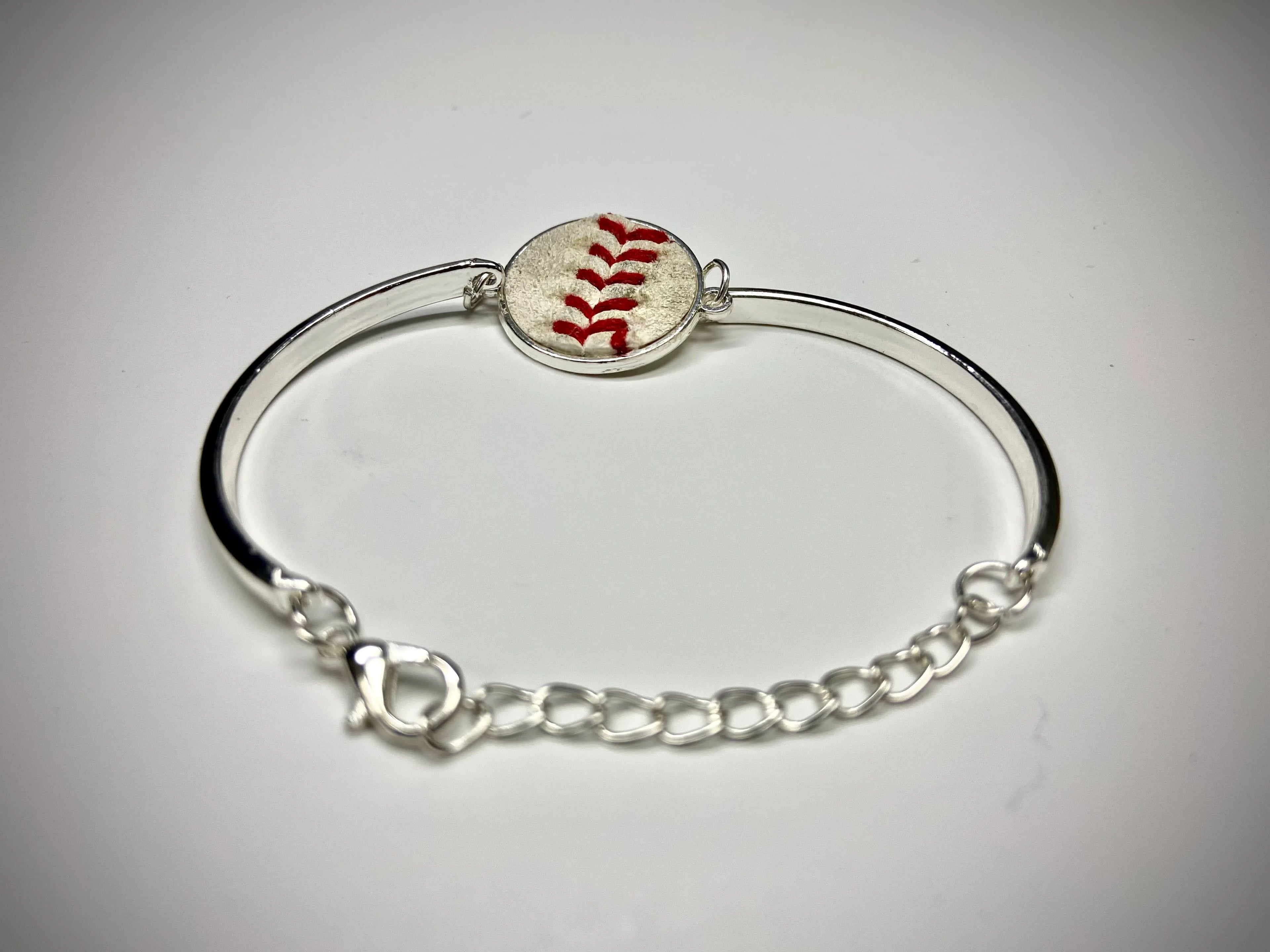 baseball seams silver bracelet on white background