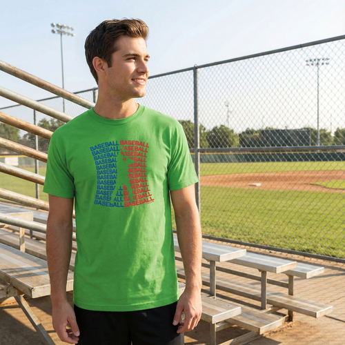 Man wearing a green t-shirt with 'Baseball' text on a baseball field