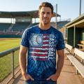 Man wearing a blue tie-dye t-shirt with 'Baseball' design on a baseball field.