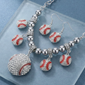 Jewelry set with baseball-themed charms on a clear stand.