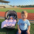 Big Bro Baseball Toddler T-Shirt worn by big brother at a baseball field.